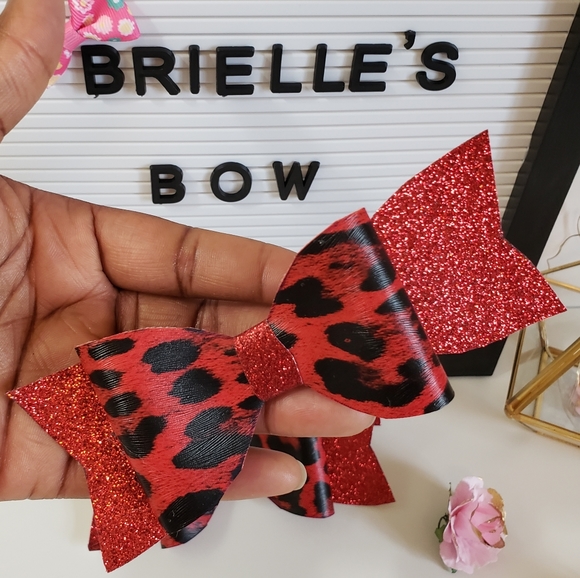 Faux leather cheetah 🐆 bow 🎀 - Picture 3 of 3